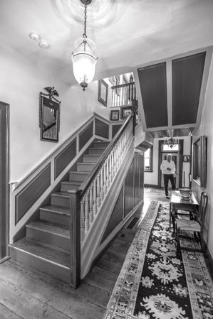 Stairs double loaded at top for independent access to front and 
